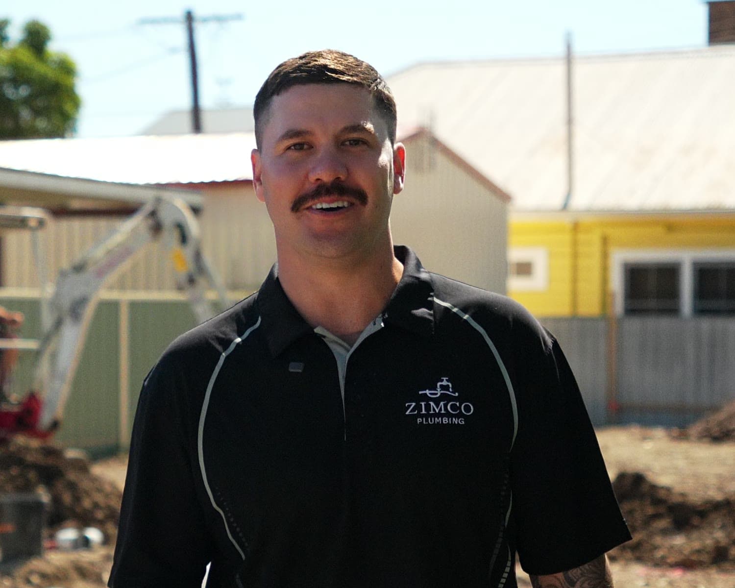 Zac Adams, owner of Zimco Plumbing, on a job site